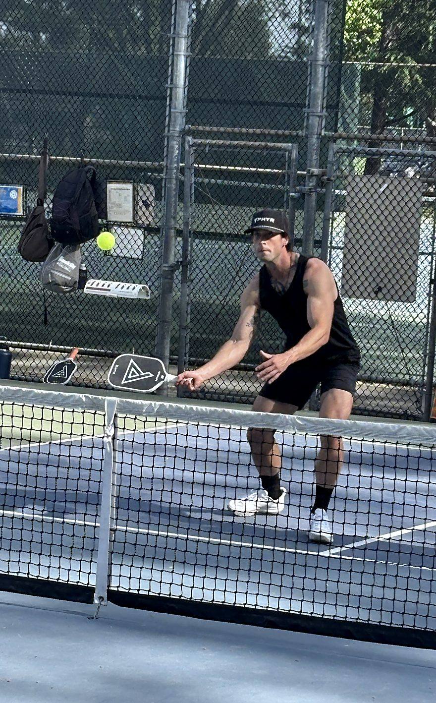 PHYR player at the net, mid-rally